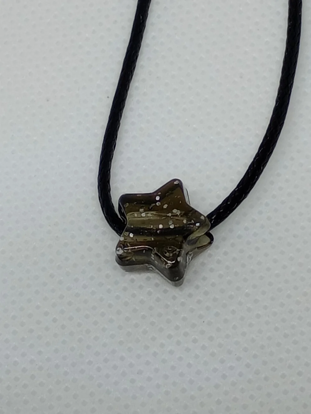 Star Pendant Necklace on Black Cord